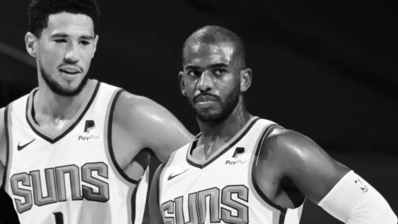NBA: Devin Booker reage a lesão que vai afastar Chris Paul do Suns